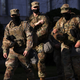 Members of the National Guard remain deployed in Washington, DC in March following deadly riots involving scores of QAnon conspiracy theorists at the Capitol on Jan. 6.